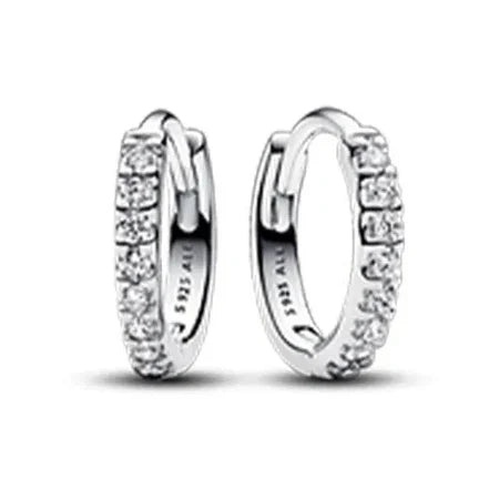 Pair of silver hoop earrings with clear stones on a white background